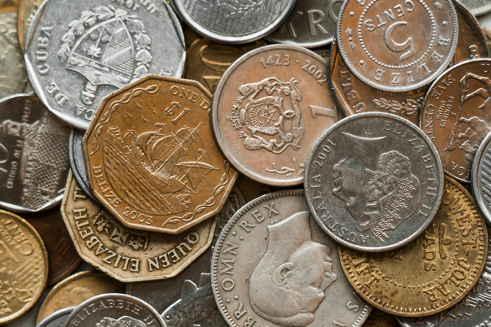 High Resolution Close Up Of Various International Coins Featuring